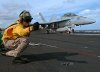 440px-US_Navy_051120-N-0119G-001_U.S._Navy_Lt._Sean_McCarthy,_a_Shooter,_gives_the_signal_to_l...jpg